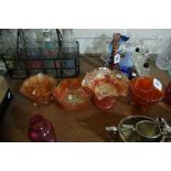 Six Orange Carnival Glass Pieces