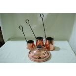 A Set Of Three Graduated Copper Measures Together With A Warmer