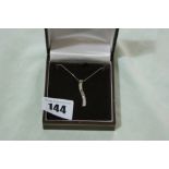 A 9 Carat White Gold Set Pendant On A Fine Link 9 Carat Chain