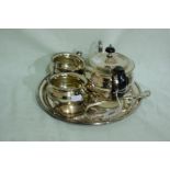 A Three Piece Plated Tea Service Together With A Circular Tray Etc