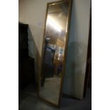 A Full Length Bevelled Glass Dressing Mirror