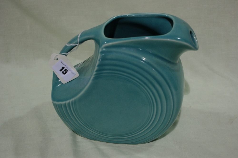 A U.S.A. Pottery Wheel Jug In A Turquoise Blue Ground
