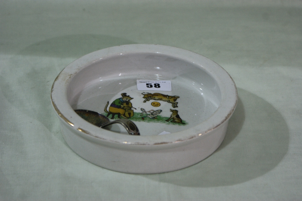 A Staffordshire China Circular Nursery Feeding Bowl Together With A Plated Pusher Spoon