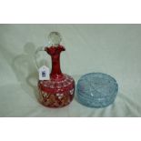 A Cranberry Tinted Claret Jug Together With A Blue Tinted Dressing Table Jar And Cover