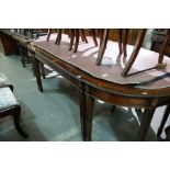 An Early 20th Century Regency Style Mahogany Three Section Dining Table Comprising A Pair Of Half