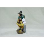 A Royal Doulton Figure "The Mask Seller" HN2103