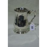 An 18th Century Circular Based Silver Tankard With Scrolled Handle, Hallmarks For London 1766 And
