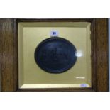 A 19th Century Wedgwood Black Basalt Oval Plaque, Relief Moulded With A Scene Of A Boar Hunt,