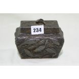 A Cast Metal Oriental Tea Caddy Relief Decorated With Swimming Carp