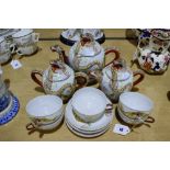 A Twelve Piece Early 20th Century Eggshell China Part Tea Set With Dragon Decoration