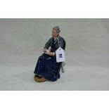 A Royal Doulton Figure "The Cup Of Tea" HN2322