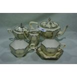 A Silver Lustre Decorated China Tea Service With Two Matching Cups And Saucers