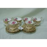 A Twelve Piece Paragon China Gilt And Floral Decorated Coffee Set