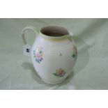 A Circular Based Floral Decorated Poole Pottery Milk Jug