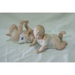 Two 19th Century Bisque China "Piano Babies"