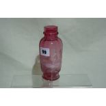 A Cranberry Tinted Mary Gregory Decorated Vase