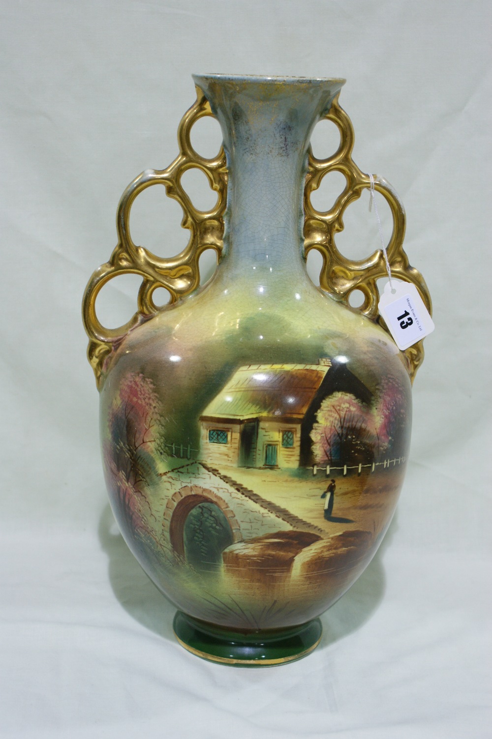 An Edwardian Pottery Two Handled Vase With Landscape Scene