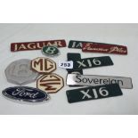 A Collection Of N.O.S. Car Badges
