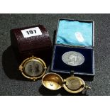 A Plated Sovereign Holder, A Boxed Silver Victoria Coin And A Yellow Metal Memoriam Brooch