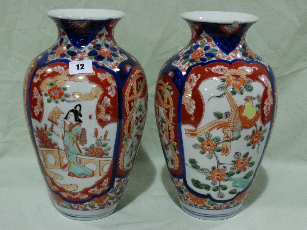 A Pair Of Circular Based Imari Decorated Baluster Vases (AF)