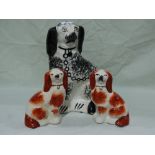 Three Staffordshire Pottery Seated Dogs