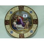 A Circular Vienna Porcelain Cabinet Plate With Centre Painted Panel Of Maidens And Cherub, Under