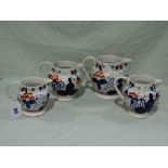 Four Gaudy Welsh Pottery Decorated Milk Jugs