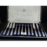 A Twelve Piece Silver Handled Fruit Knife And Fork Set