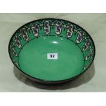 A Royal Doulton Black And Green Ground Flambe Ware Circular Fruit Bowl With Fruit Decoration