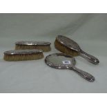 Three Silver Backed Dressing Table Brushes And A Mirror