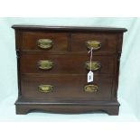 A Miniature Mahogany Chest Of Two Short And Two Long Drawers