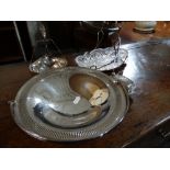 A Circular Based Silver Plated Fruit Basket Together With A Shell Shaped Butter Dish Etc