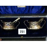 A Pair Of Cased Silver Two Handled Salts