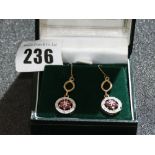 A Pair Of Diamond And Ruby Set Gold Earrings