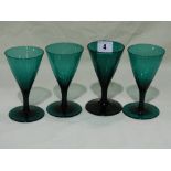 Four Matching Green Tinted Circular Based Stemmed Glasses