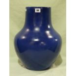 A Large Circular Based Moorcroft Pottery Powder Blue Floor Vase Of Bulbous Form, 16" High