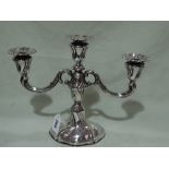 A German Silver Oval Based Three Branch Candelabrum