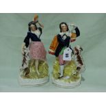 A Pair Of Staffordshire Pottery Dancing Musician Figures