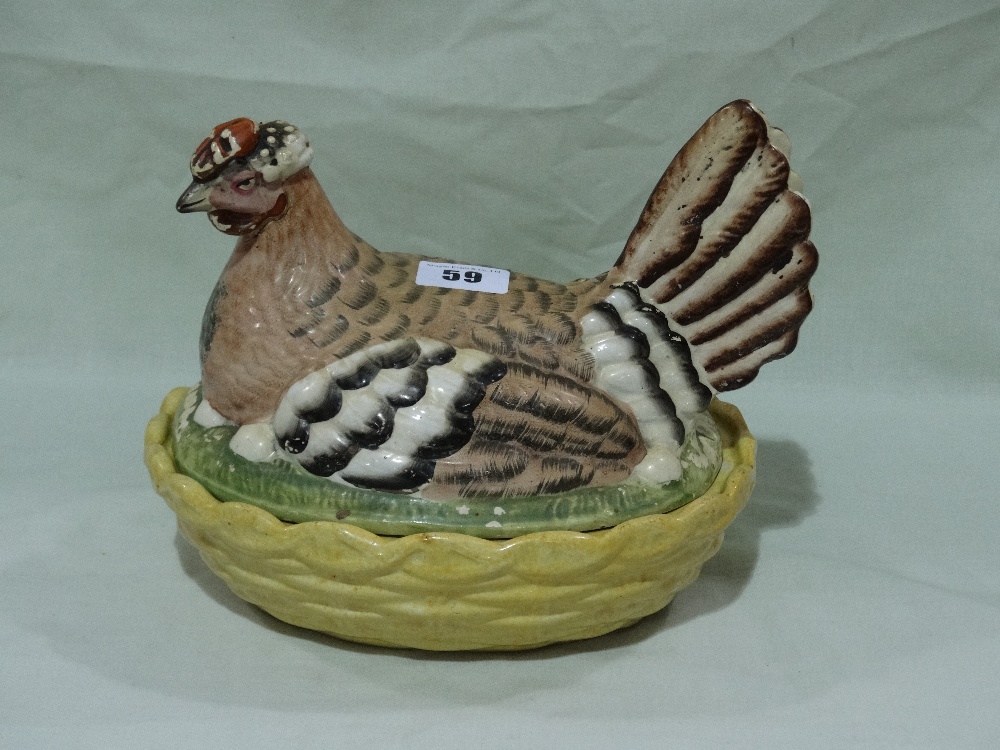 A Staffordshire Pottery Coloured Hen On Nest (Star Crack To Base)