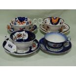 Four Gaudy Welsh Pottery Tea Cups And Saucers