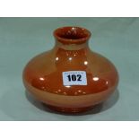 A Circular Based Moorcroft Pottery Orange Lustre Glazed Squat Vase
