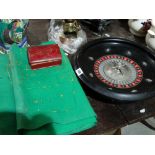 A Vintage Roulette Wheel And Baise