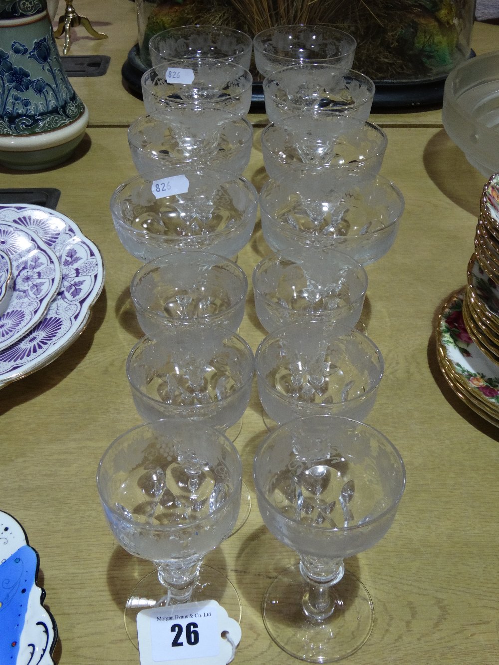 Fourteen Circular Based Etched Drinking Glasses