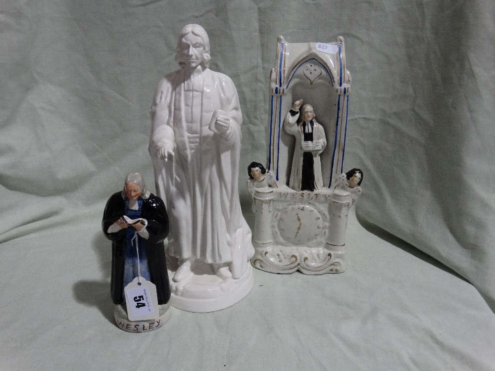 A Staffordshire Pottery Clock Group Of Wesley In The Pulpit Together With Two Further Wesley