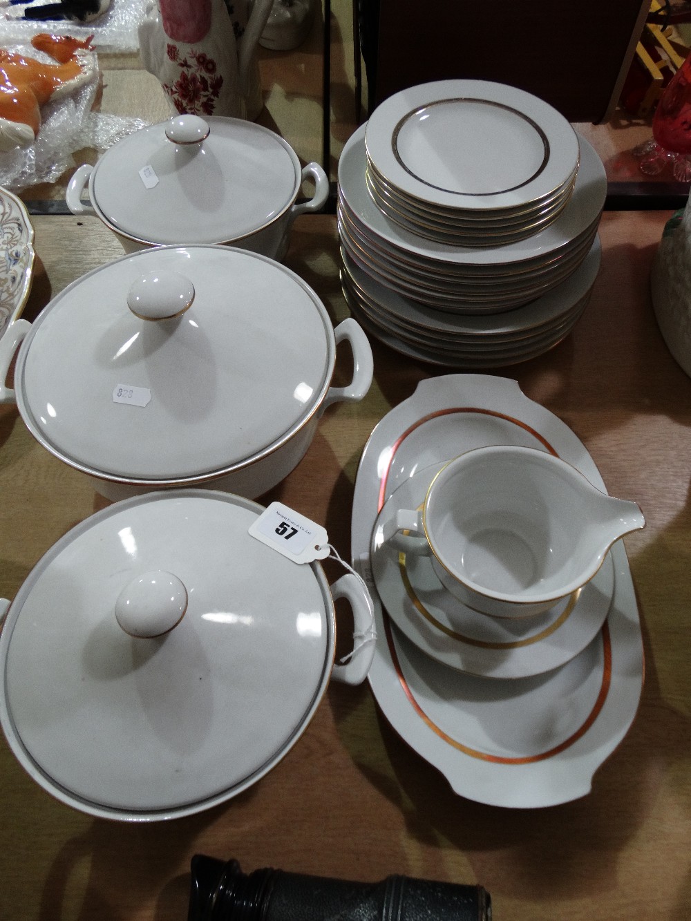 A Quantity Of Gilt Lined German Porcelain Dinner Ware