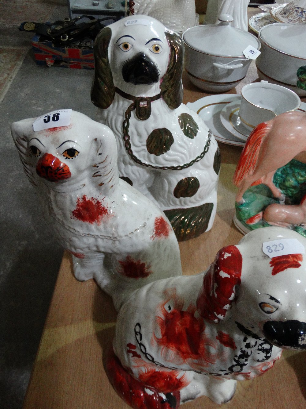 Three Staffordshire Pottery Seated Dogs