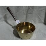 A Brass Saucepan With Steel Handle