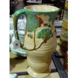 A Large Circular Based Moulded Carlton Ware Water Jug With Stylised Acorn And Branch Design