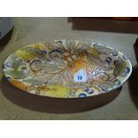 An Oval Charlotte Rhead Decorated Fruit Pattern Serving Dish