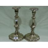 A Pair Of Circular Based Plated Candle Holders